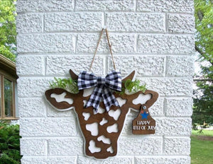 Cow door hanger